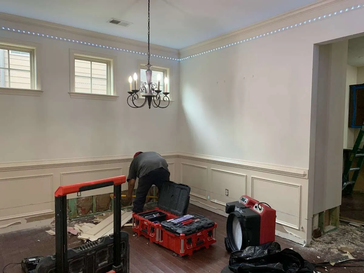 Restoration technician with professional equipment in Tuckahoe